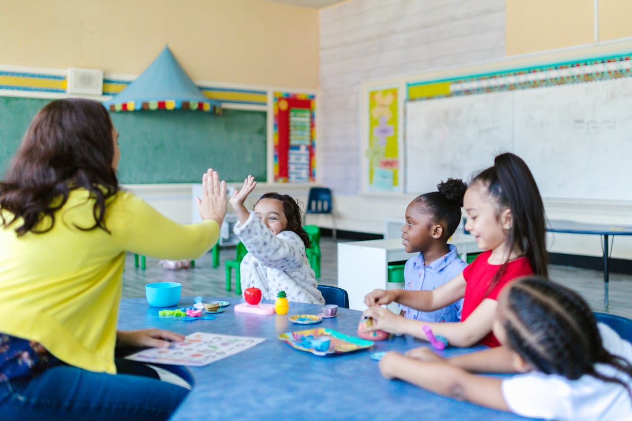 Behavior technician working one-on-one with a young child during an ABA therapy session